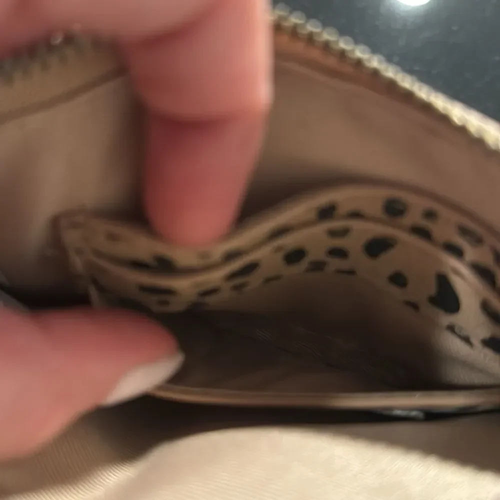 Chic Leopard Print Wristlet with Tan Accent